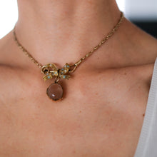 Load image into Gallery viewer, Victorian 9K Rose Gold Oval Rock Crystal Pools of Light Locket