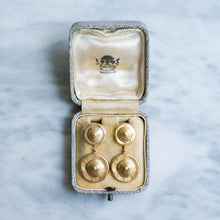 Load image into Gallery viewer, Set of gold earrings in an open jewelry box on a marble surface
