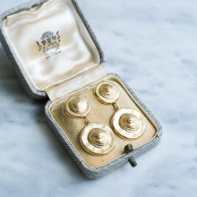Load image into Gallery viewer, Gold earrings in a jewelry box on a light gray background
