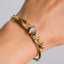 Load image into Gallery viewer, Antique Victorian 14K Yellow Gold Swallow and Cabochon Heart Moonstone Bangle
