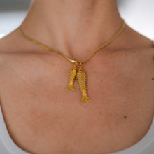 Load image into Gallery viewer, Vintage 22K Yellow Gold Small Articulated Fish Pendant
